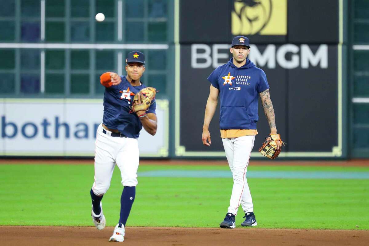 Jeremy Peña, shown here taking ground balls in front of Carlos Correa before an American League Division Series game on Oct. 8, 2021, is next in line at shortstop for the Astros if Correa leaves.