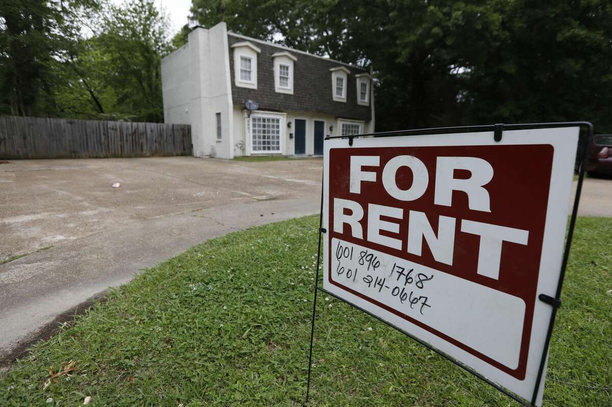 FILE - In this April 23, 2018, file photo a for rent sign denotes the availability of another existing home in Jackson, Miss. Millennials are delaying homeownership and staying in leased housing longer than previous generations, studies show. (AP Photo/Rogelio V. Solis, File)