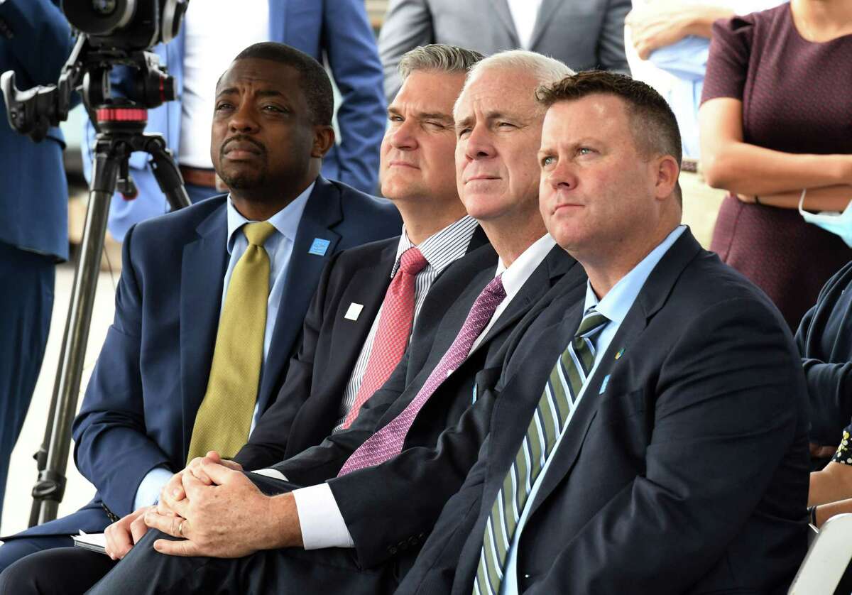 Lt. Gov. Brian Benjamin, left, David Hardy, CEO of Ørsted, Joe Noland, CEO of Eversource, and Chris Johnston, VP Riggs-Distler, right, attend an announcement where Lt. GOv. Benjamin made public that the Port of Coeymans will play a role in construction of a planned offshore wind turbine farm in Long Island on Friday , Oct. 8, 2021, in Coeymans N.Y. The port will serve as a fabrication site for constructing turbine platforms. 