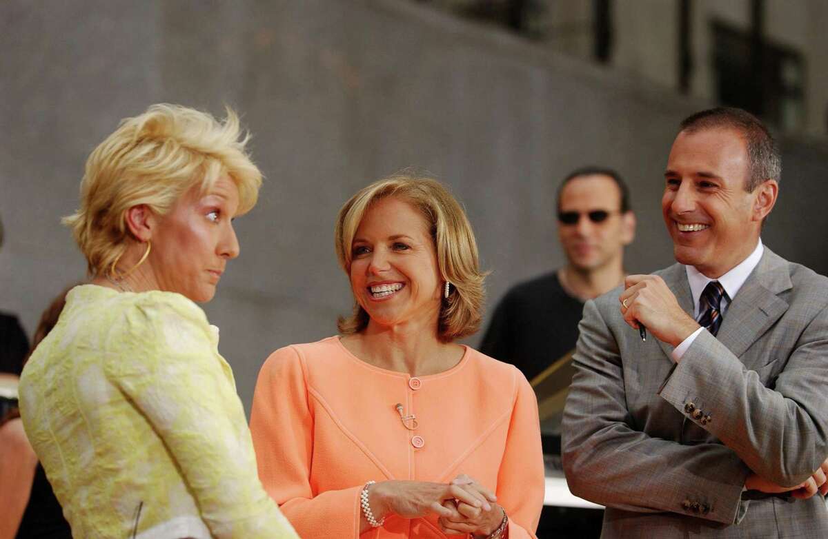 Singer Celine Dion jokes with NBC co-anchors Katie Couric and Matt Lauer in 2003.