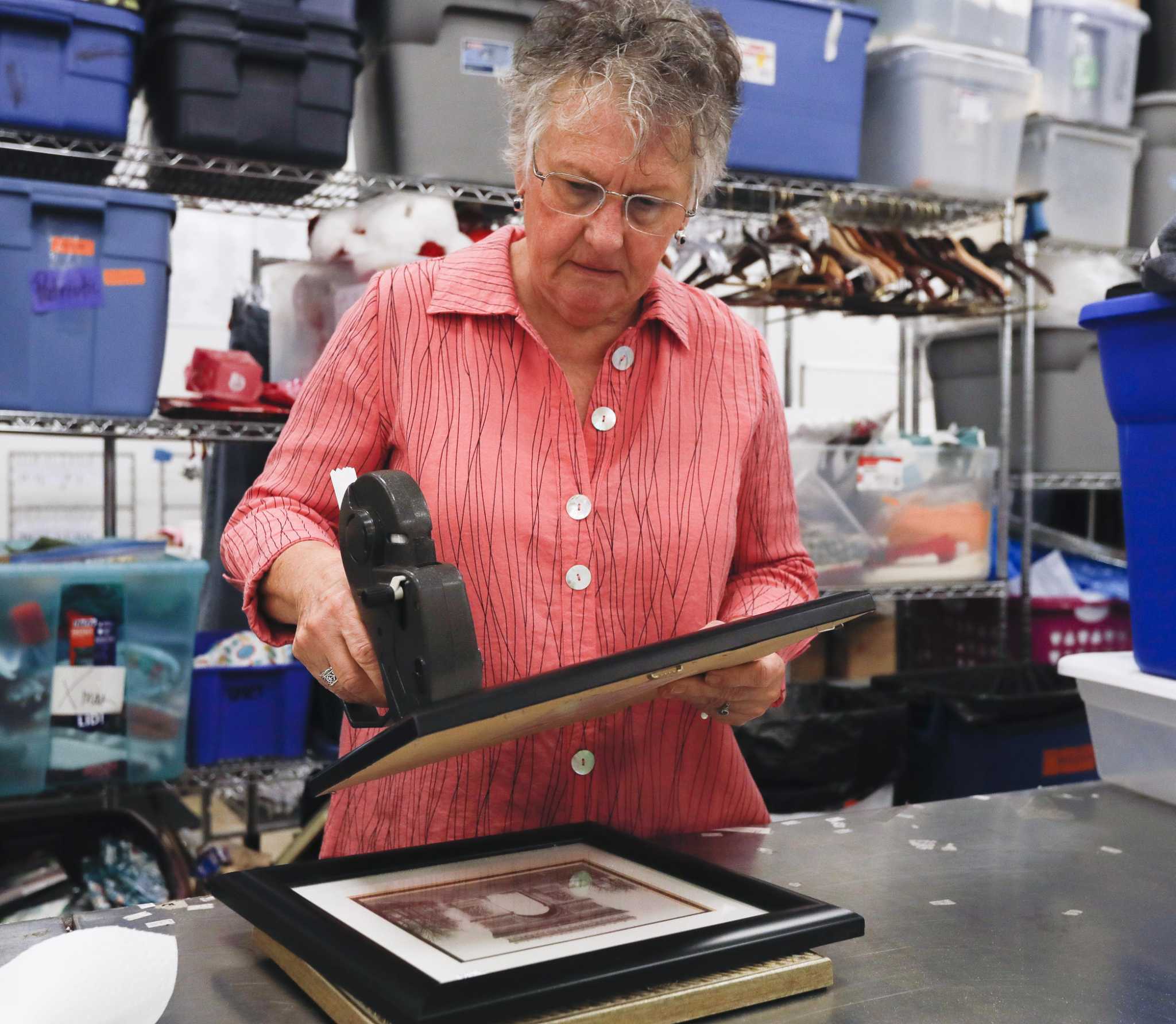 Woodlands volunteer helps return antique books to original owners