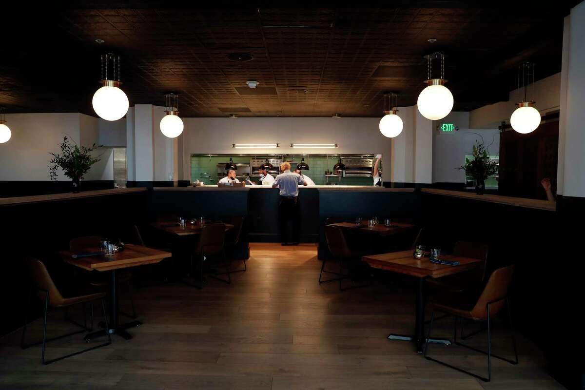 Tribune restaurant in Oakland still looks somewhat empty two months after its opening because some furnishings and decor are still in transit.