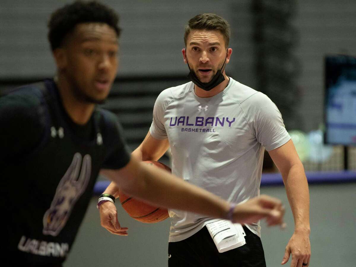 University at Albany men’s basketball assistant coach Matt Griffin, right, seen here during a fall practice, is joining FGCU.