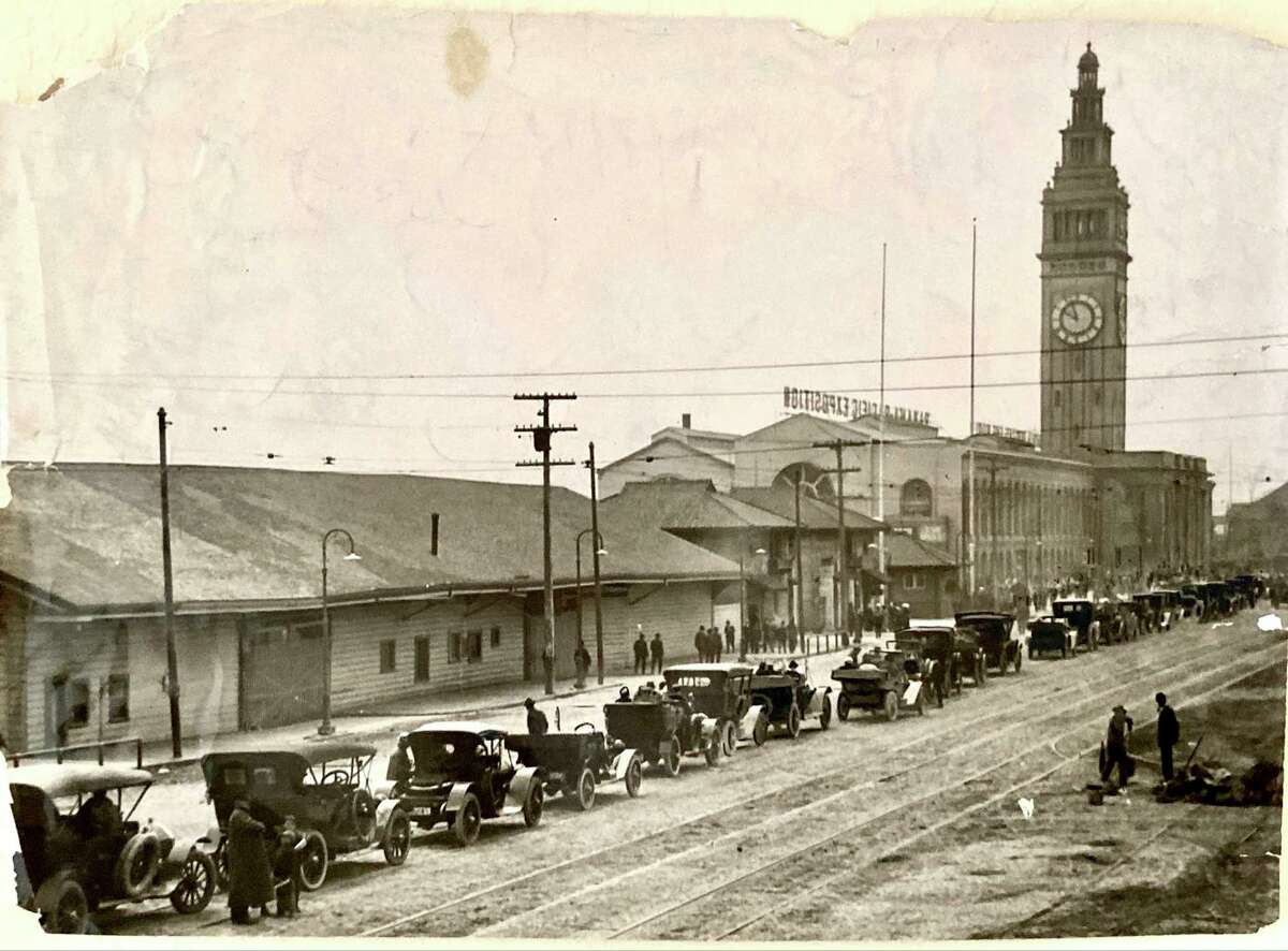 Automobiles line up at the Ferry Building in San Francisco in 1915, waiting for a ferry arrival from Sausalito.