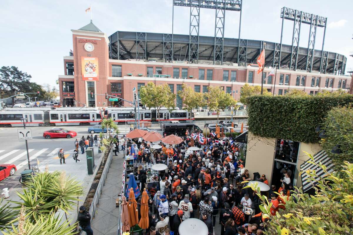 San Francisco Giants fans packed outdoors patio at MoMo's, a sports bar and restaurant which sits across the street from Oracle Park in San Francisco, California, on Oct. 8, 2021 before game one of the National League Division Series.