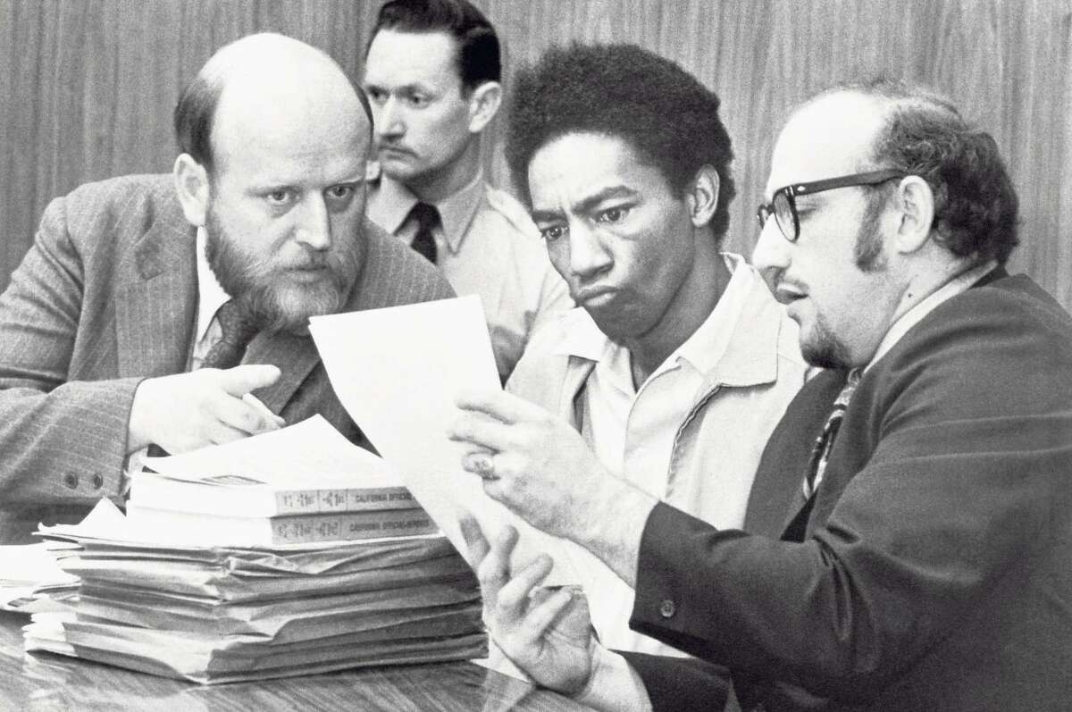 Ruchell Magee (second from right) has been in prison for 50 years, while the shooter of President Ronald Reagan is free.