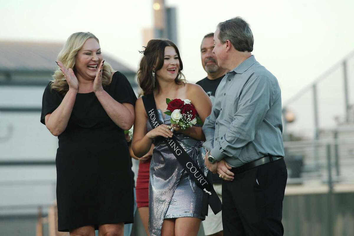 Lauren Ogburn reacts after being named Pearland High School Homecoming Queen before the game against Alief Elsik Friday at The Rig.