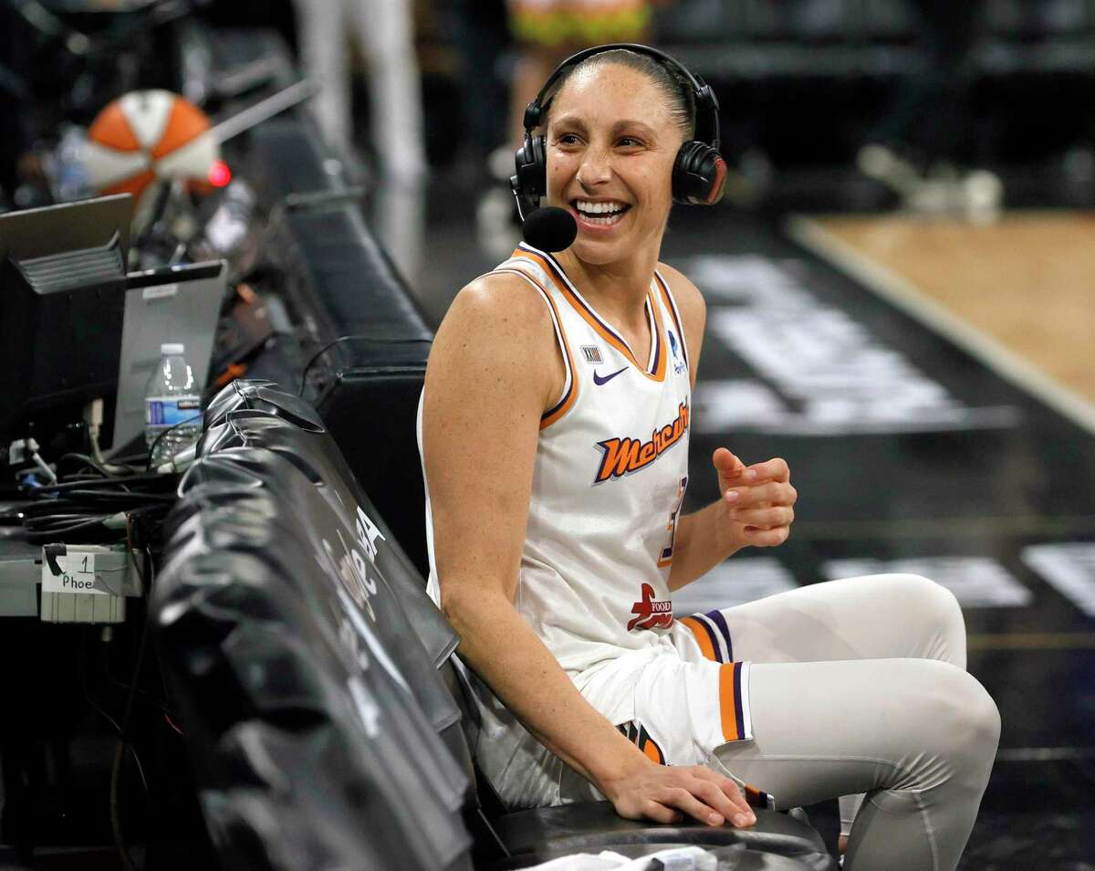 LAS VEGAS, NEVADA - OCTOBER 08: Diana Taurasi #3 of the Phoenix Mercury reacts to cheering fans as she waits for a television interview after the team's 87-84 victory over the Las Vegas Aces in Game Five of the 2021 WNBA Playoffs semifinals to win the series at Michelob ULTRA Arena on October 8, 2021 in Las Vegas, Nevada. NOTE TO USER: User expressly acknowledges and agrees that, by downloading and or using this photograph, User is consenting to the terms and conditions of the Getty Images License Agreement. (Photo by Ethan Miller/Getty Images)
