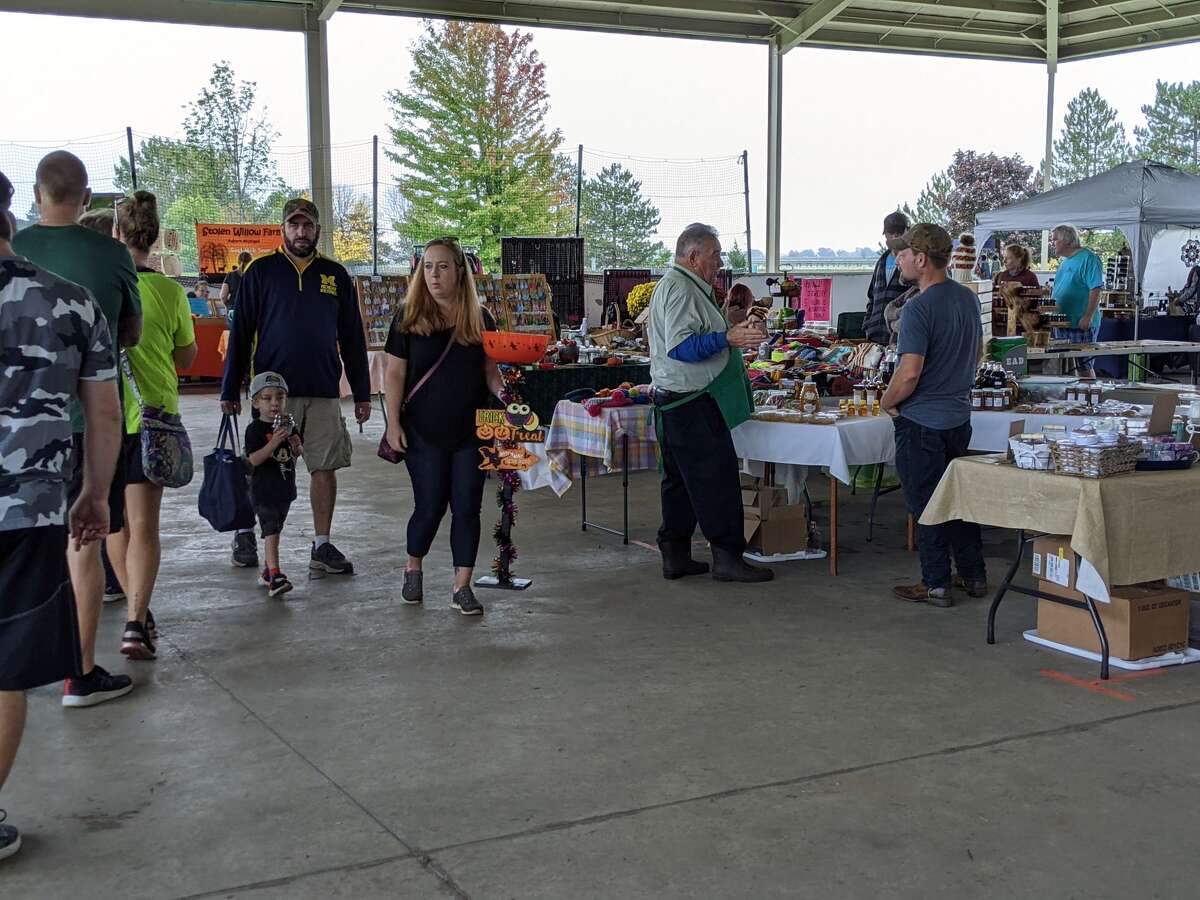 About 2,000 people attended the second annual Auburn Holly-ween Daze at the Auburn Farmers Market Saturday. There were 85 vendors, music, food, free children vision screening and more.