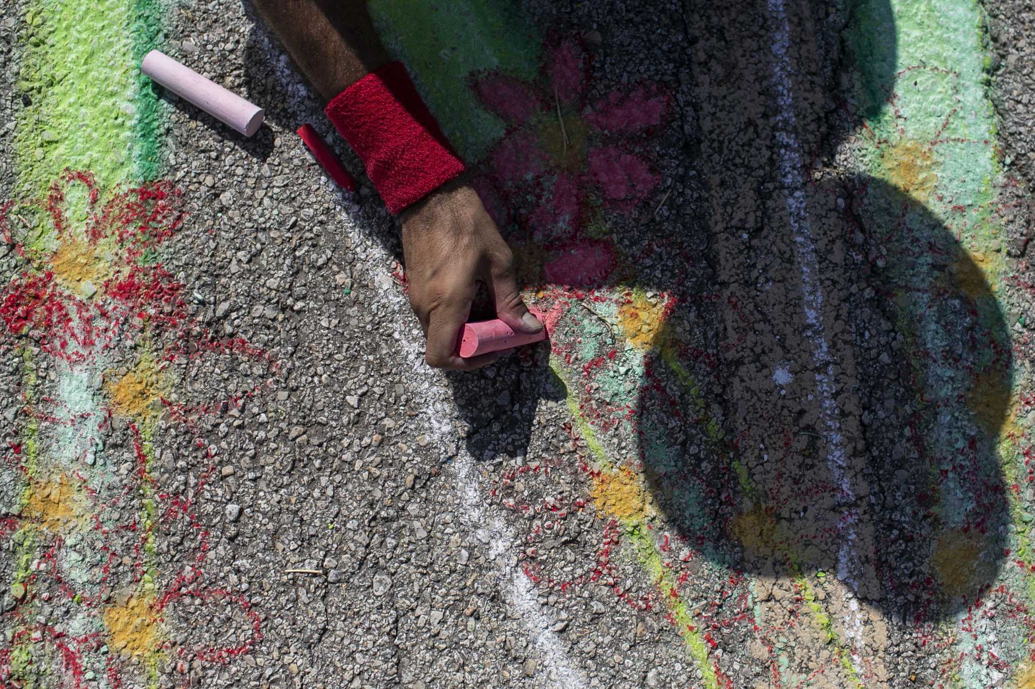Making art 'accessible': San Antonio artists, community members come together to decorate sidewalks, pavement - Vimarsana News