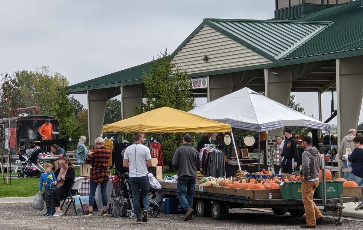 About 2,000 people attended the second annual Auburn Holly-ween Daze at the Auburn Farmers Market Saturday. There were 85 vendors, music, food, free children vision screening and more.