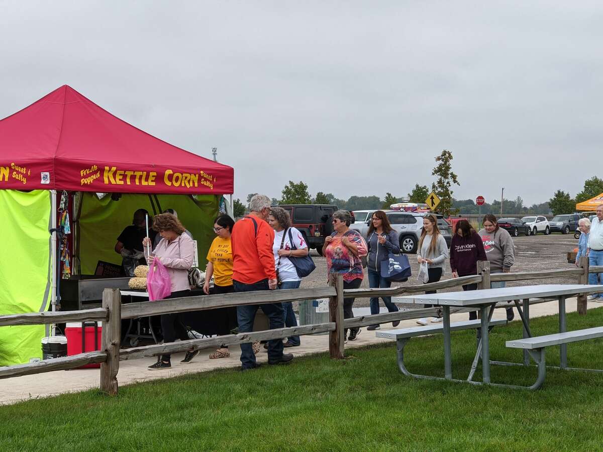 About 2,000 people attended the second annual Auburn Holly-ween Daze at the Auburn Farmers Market Saturday. There were 85 vendors, music, food, free children vision screening and more.