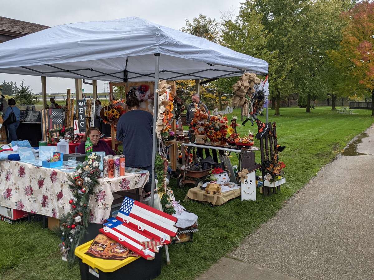 About 2,000 people attended the second annual Auburn Holly-ween Daze at the Auburn Farmers Market Saturday. There were 85 vendors, music, food, free children vision screening and more.