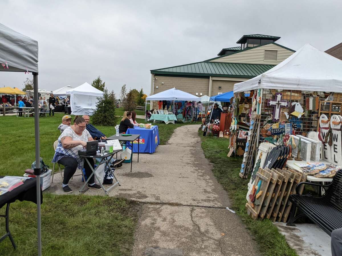 About 2,000 people attended the second annual Auburn Holly-ween Daze at the Auburn Farmers Market Saturday. There were 85 vendors, music, food, free children vision screening and more.