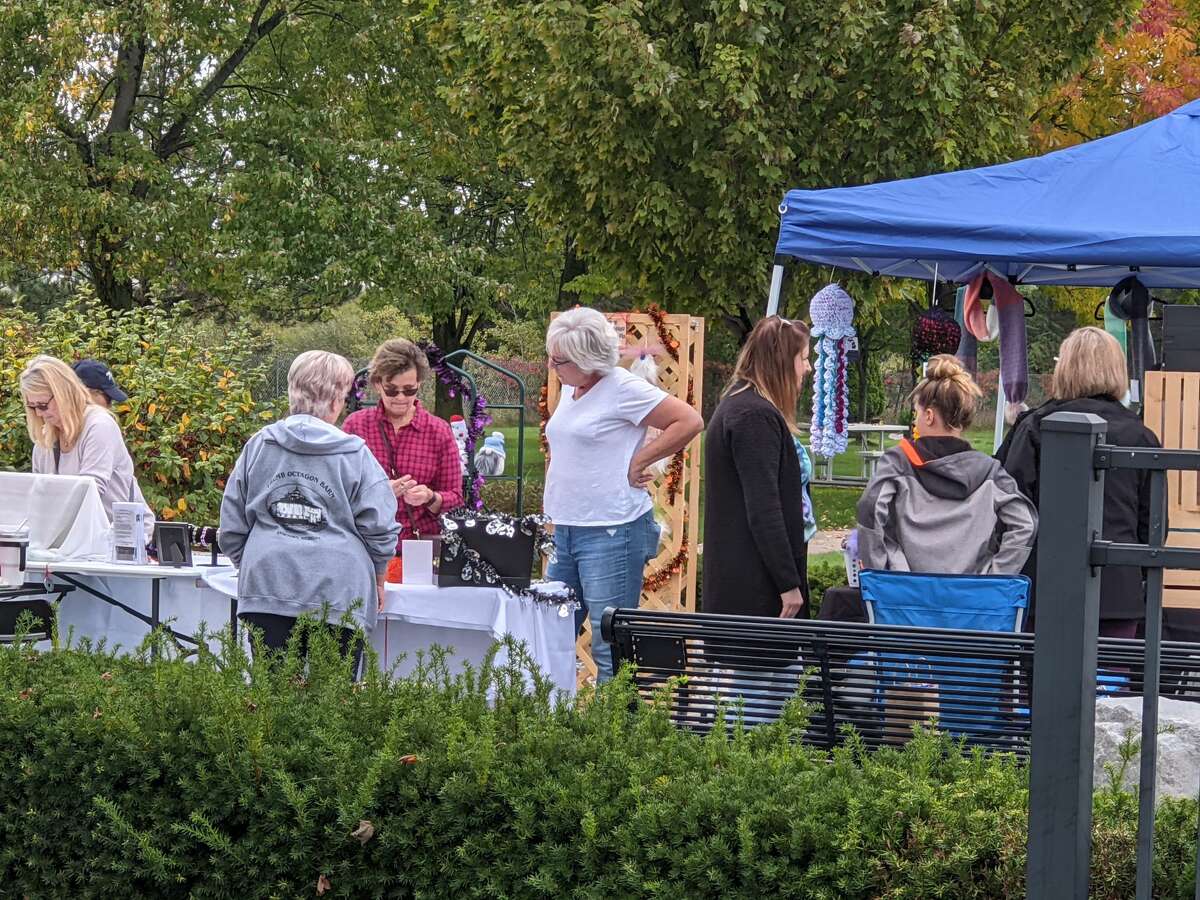 About 2,000 people attended the second annual Auburn Holly-ween Daze at the Auburn Farmers Market Saturday. There were 85 vendors, music, food, free children vision screening and more.
