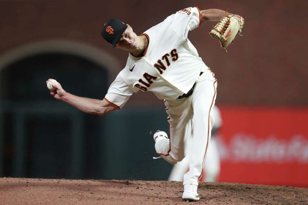 San Francisco Giants' Tyler Rogers throws against the Los Angeles Dodgers in the eighth inning of Game 1 of the National League Division Series at Oracle Park on October 8, 2021 in San Francisco.
