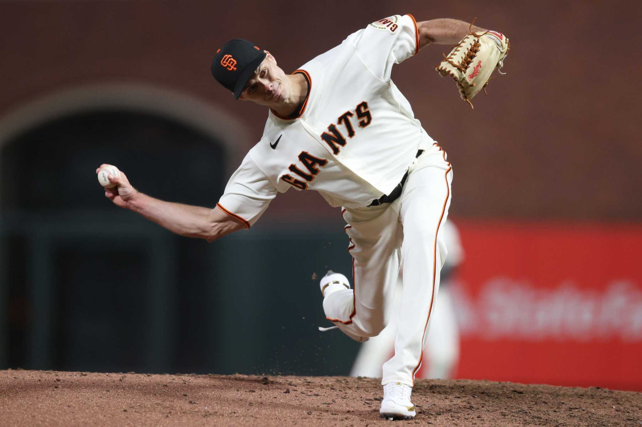 Why Giants reliever Tyler Rogers wears those A's-reminiscent white cleats