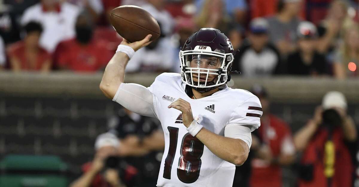 Eastern Kentucky quarterback Parker McKinney (18) attempts a pass during the first half of an NCAA college football game in Louisville, Ky., Saturday, Sept. 11, 2021. (AP Photo/Timothy D. Easley)
