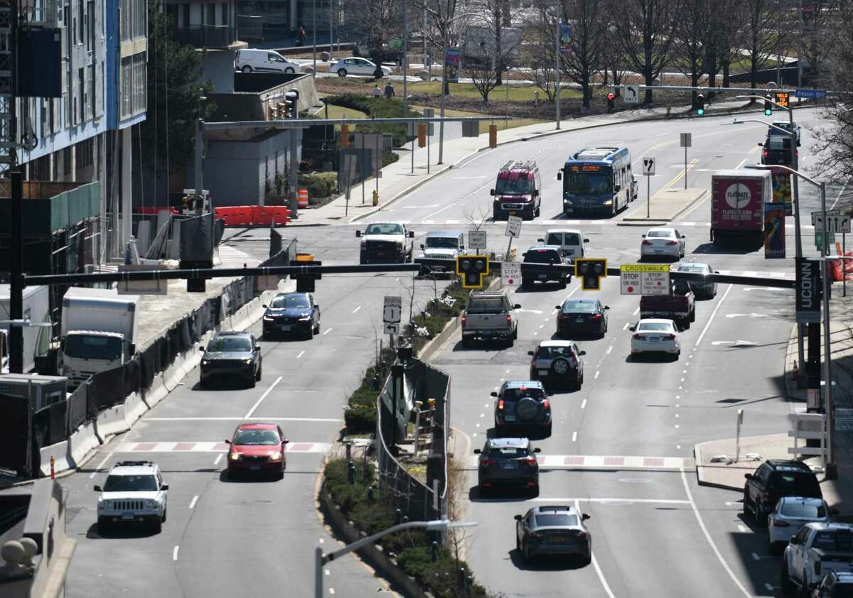 Traffic moves along Washington Boulevard in Stamford, Conn. Monday, March 22, 2021. Proposed mobility changes have been presented before the zoning board and could reconfigure traffic, bikes, and parking throughout the city.