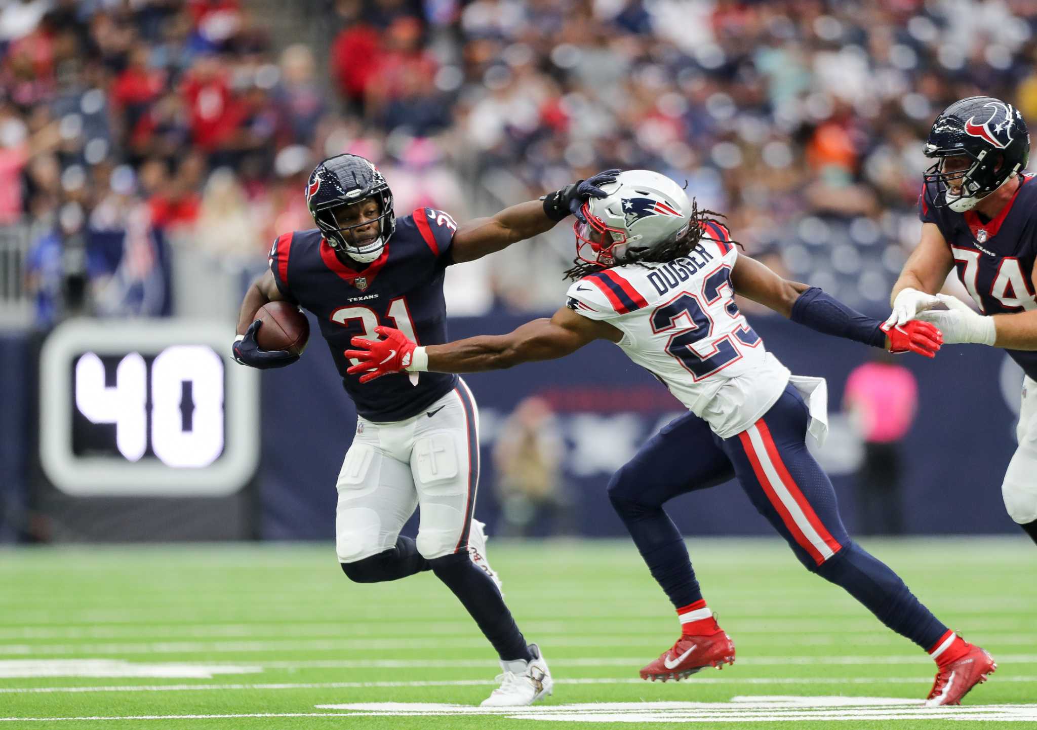 HOUSTON, TX - OCTOBER 10: Houston Texans tight end Pharaoh Brown (85) warms  up before the football game between the New England Patriots and Houston  Texans at NRG Stadium on October 10