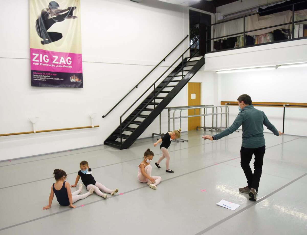 Artistic Director and Founder Brett Raphael leads four-year-olds through auditions for "The Nutcracker" at Connecticut Ballet in Stamford, Conn. Sunday, Oct. 10, 2021. After a two year hiatus due to COVID, "The Nutcracker" will return this year with performances on Dec. 18 and 19 at The Palace in Stamford.