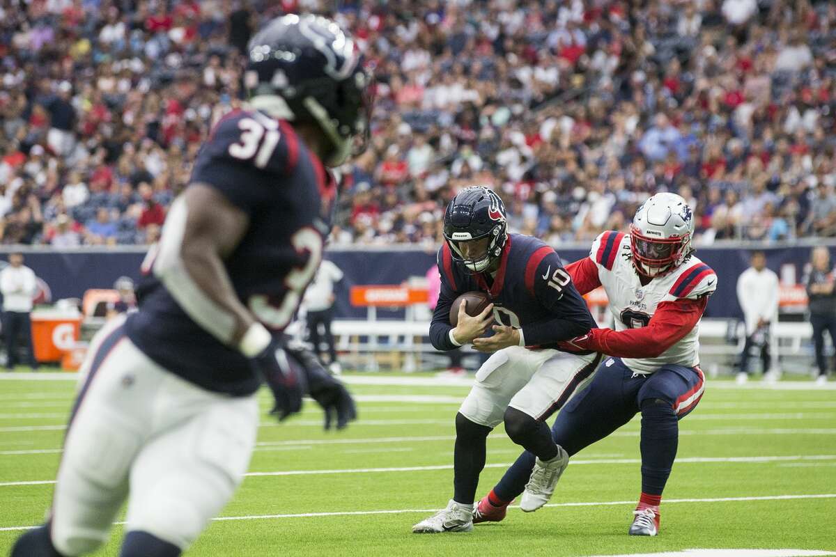 HOUSTON, TX - OCTOBER 10: Houston Texans quarterback Jeff Driskel (6) warms  up before the football game between the New England Patriots and Houston  Texans at NRG Stadium on October 10, 2021