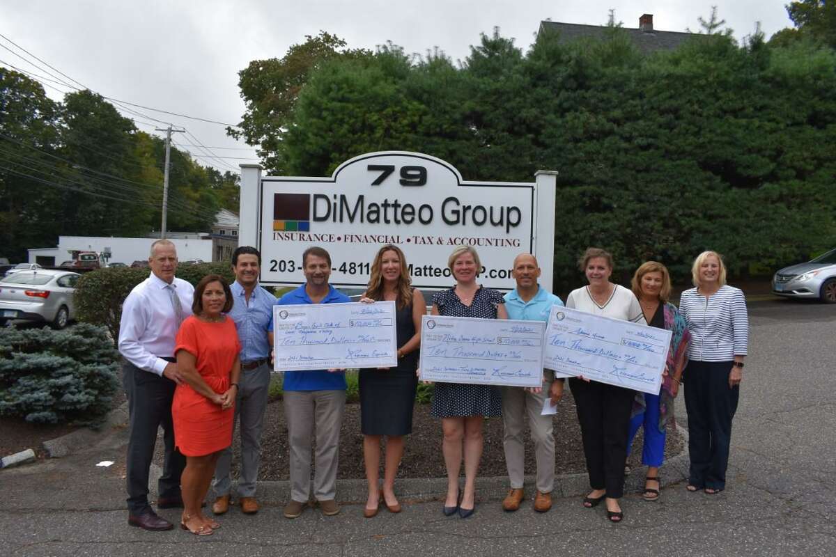 The DiMatteo Family Charitable Foundation this year contributed $10,000 each to the Boys & Girls Club of the Lower Naugatuck Valley and Adam's House, both located in Shelton, and the Tony DiMatteo Scholarship Fund.Pictured, left to right, are Robert and Loretta Lesko of Shelton, John Esposito of Middlebury, John Schaible of Milford and Shaye Roscoe of Shelton, Executive Director, both affiliated with the Boys and Girls Club of the Lower Naugatuck Valley; Julie Coyle Davis of Stratford, Advancement Director, Notre Dame High School; John DiMatteo of Bethany, Allison Wysota of Milford, founder and Executive Director of Adam's House; Rosemarie Esposito of Shelton, and Arlene Greco of Naugatuck, Adam's House.