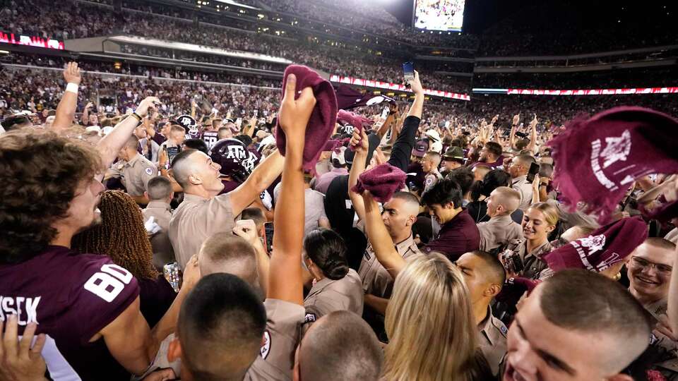 Texas A&M students pack Kyle Field after Texas A&M upset Alabama 38-41 in an NCAA college football game on Saturday, Oct. 9, 2021, in College Station, Texas. (AP Photo/Sam Craft)