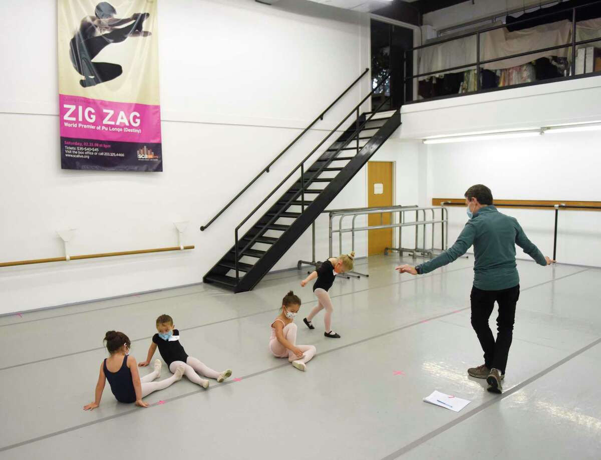 Artistic Director and Founder Brett Raphael leads four-year-olds through auditions for "The Nutcracker" at Connecticut Ballet in Stamford, Conn. Sunday, Oct. 10, 2021. After a two year hiatus due to COVID, "The Nutcracker" will return this year with performances on Dec. 18 and 19 at The Palace in Stamford.