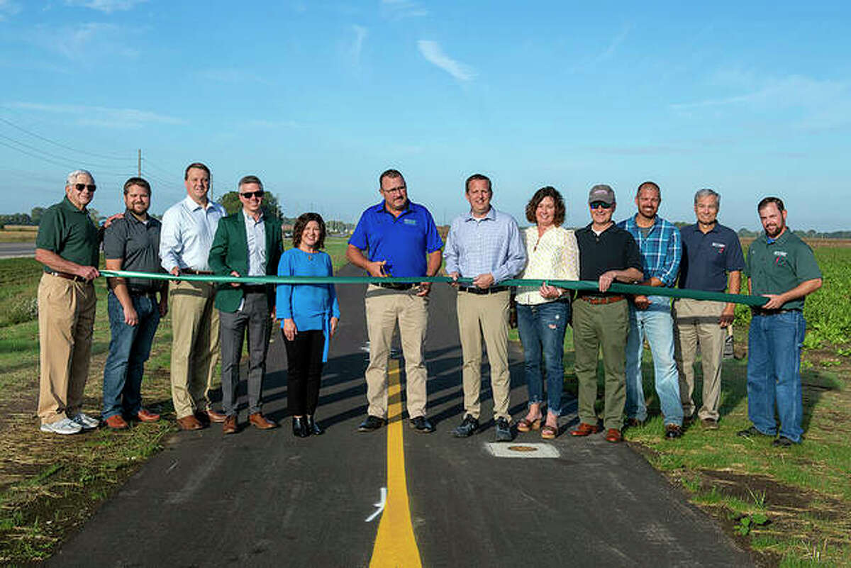 From left, former MCT Managing Director Jerry Kane, Phillip Jones of Oates Associates, Madison County Administrator Dave Tanzyus, MCT Managing Director SJ Morrison, Madison County Board member Stacey Pace, Troy Mayor Dave Nonn, MCT Board Members Allen Adomite and Kelly Schmidt, MCT Board Chairman Ron Jedda, Jason Govreau of Keller Construction, MCT Director of Engineering Mark Steyer and MCT Assistant Project Manager Jon Martin.