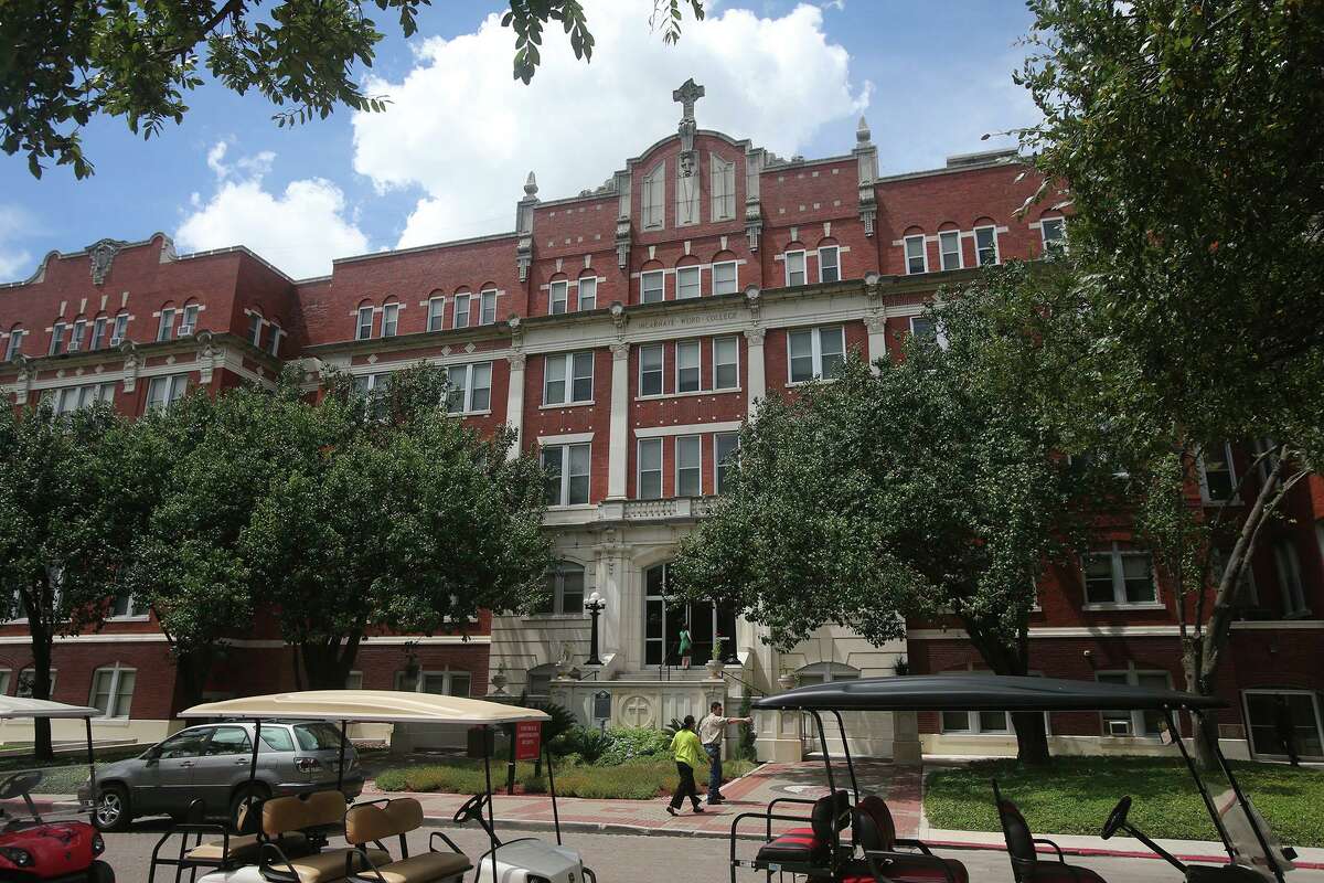 People walk through campus at the University of the Incarnate Word in 2016.