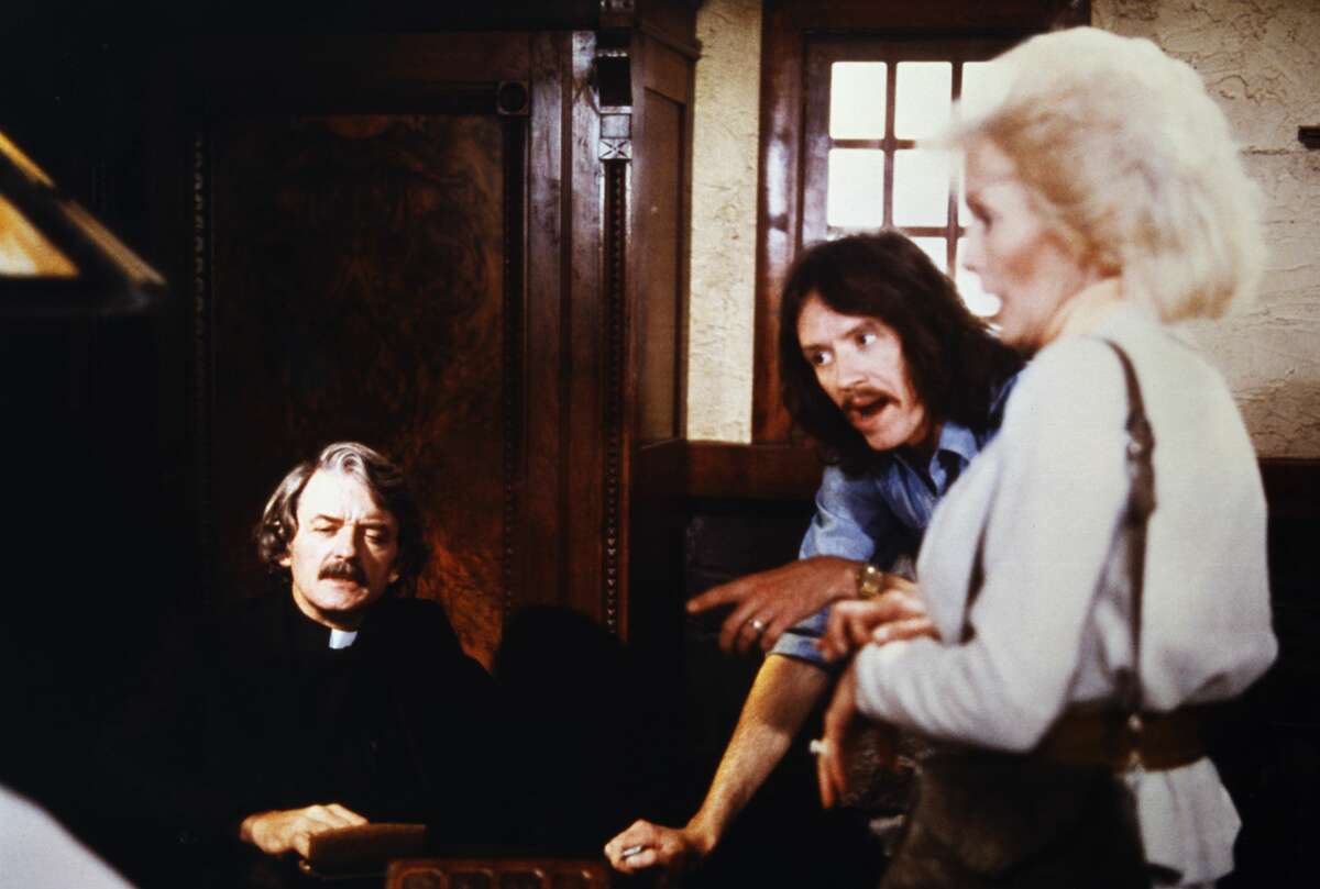 Director John Carpenter, Hal Holbrook and Janet Leigh on the set of "The Fog."