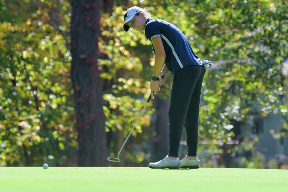 Kennedy Swedick of the Albany Academy for Girls putts toward the cup on the 10th green during the final round of the Section II girls' golf sectionals at the McGregor Links Country Club on Tuesday, Oct. 12, 2021, in Wilton, N.Y. Swedick was named Athlete of the Year for the third straight season.