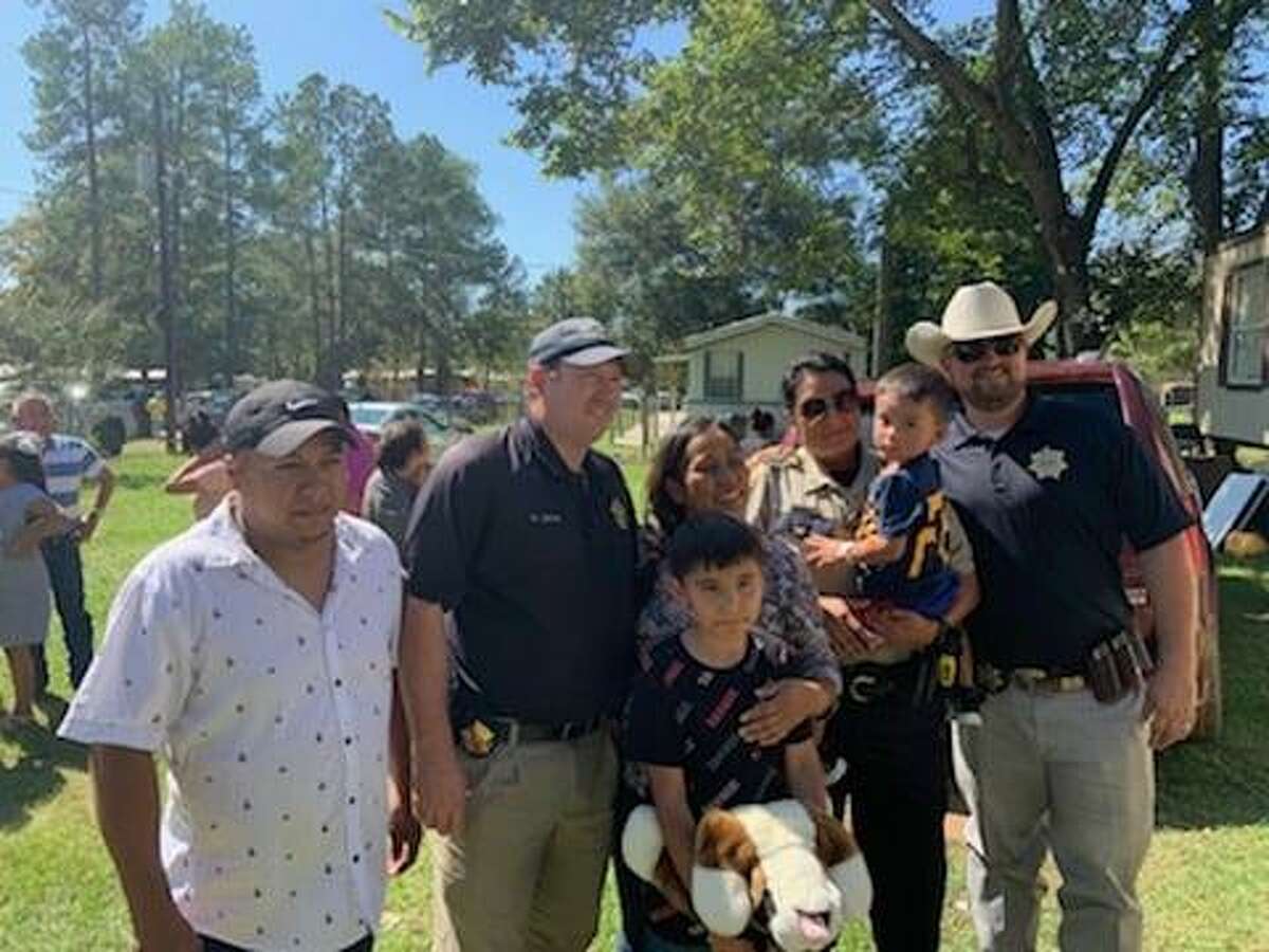 The Grimes County Sheriff's Office honored 3-year-old Christopher Ramirez Monday with the junior deputy badge for surviving three days after he vanished in the woods in Planterville, Texas. 
