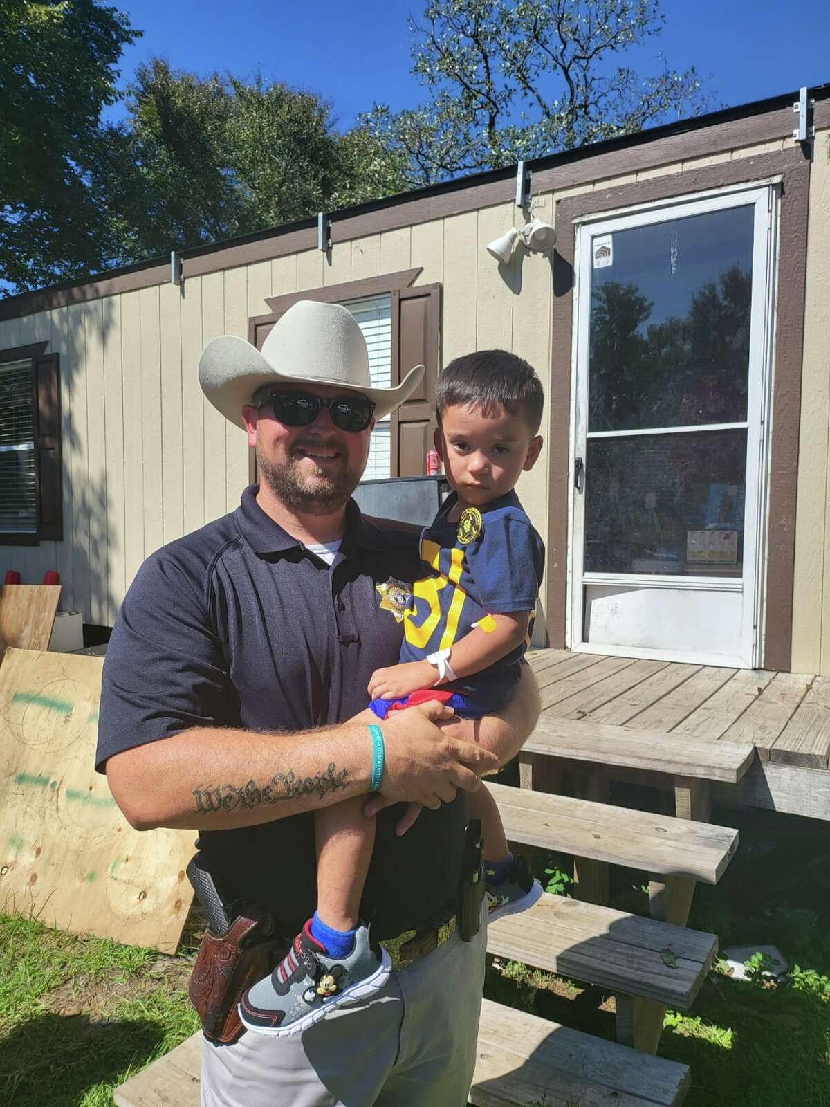 The Grimes County Sheriff's Office honored 3-year-old Christopher Ramirez Monday with the junior deputy badge for surviving three days after he vanished in the woods in Planterville, Texas. 