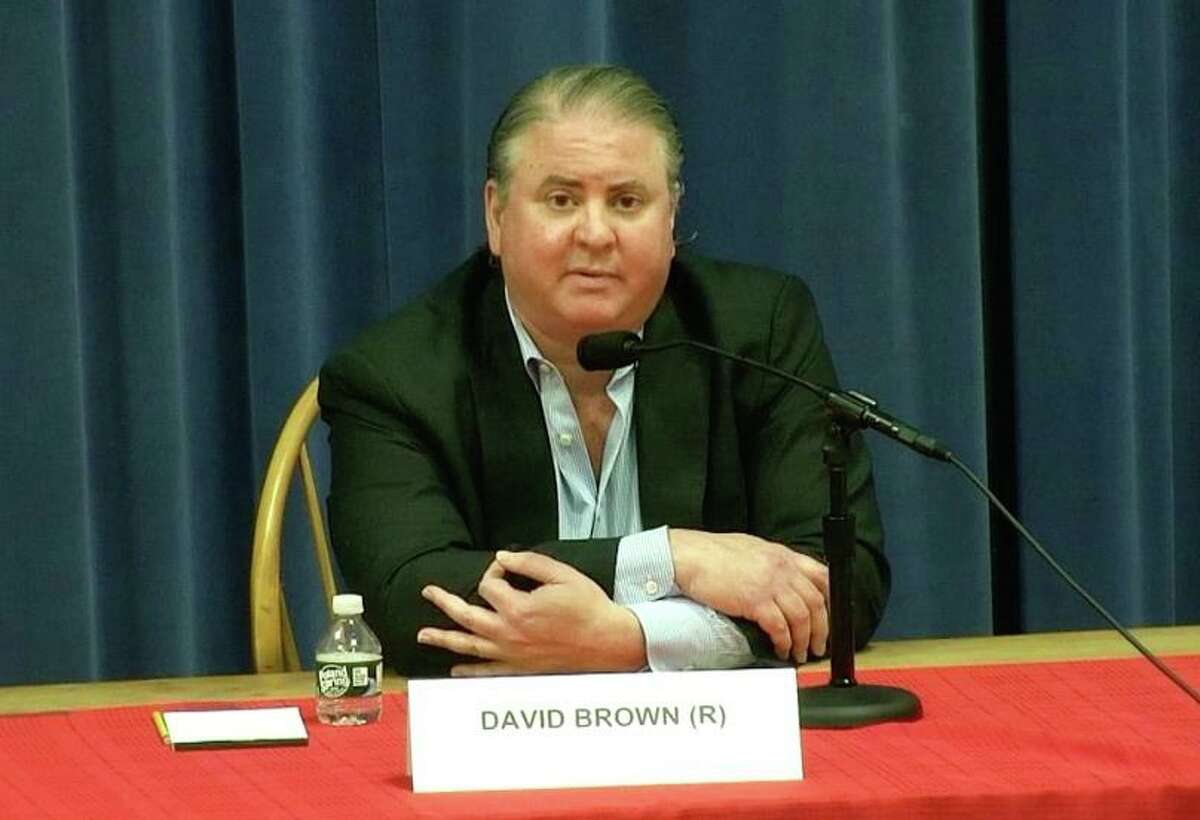 Darien Republican Board of Education member David Brown made a gesture during last week’s candidates forum that Democrats have claimed may have been a white supremacy symbol.
