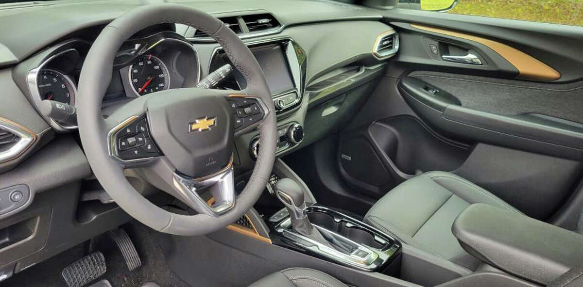 The 2022 Chevrolet Trailblazer ACTIV exemplary  comes with "leatherette" seats, country   for up   to 5  people, and a leather-wrapped heated steering wheel.