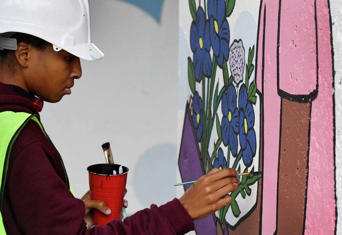 Mural adding a splash of color under Collar City Bridge