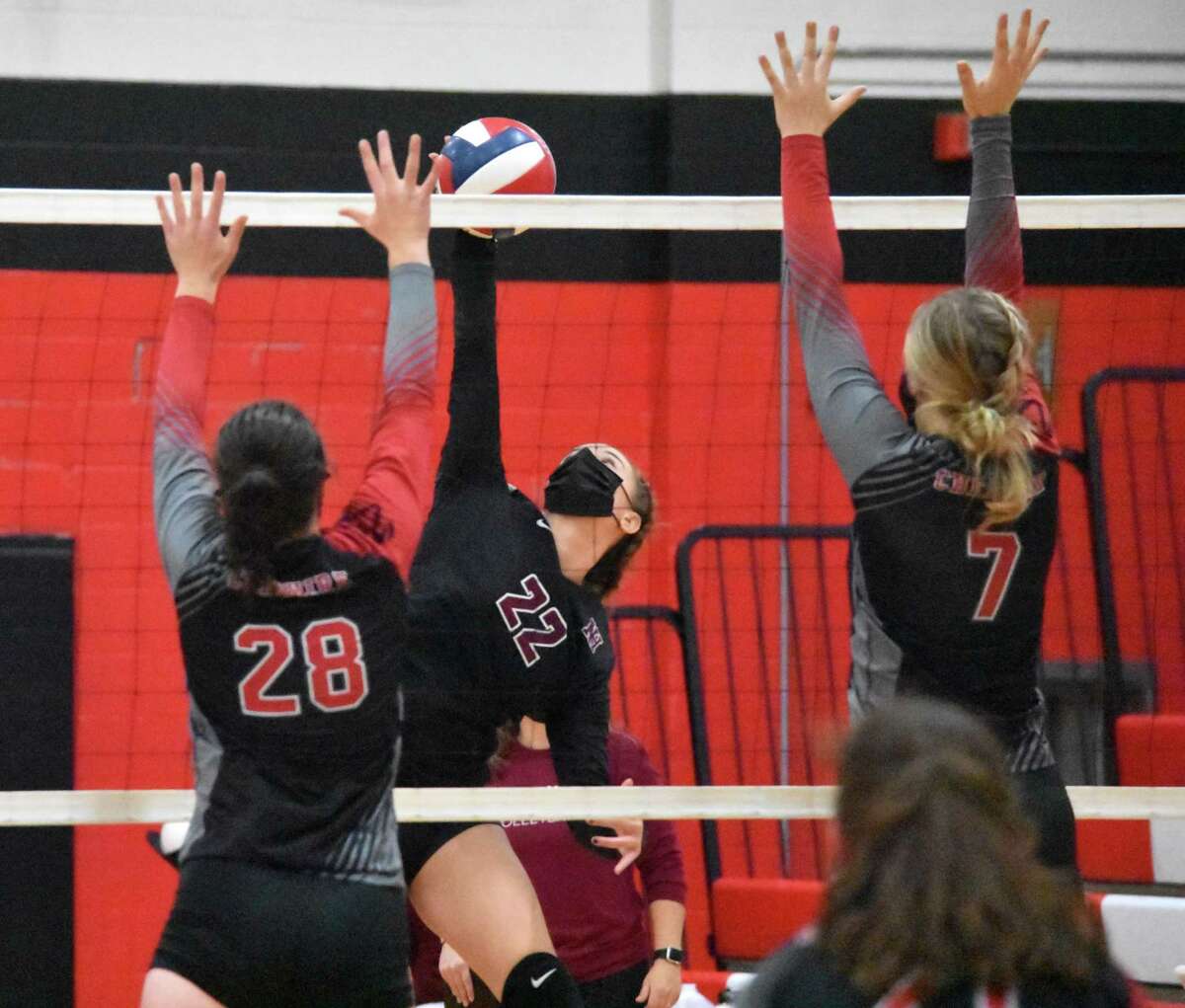 North Haven’s Caroline Toni spikes the ball against Cheshire in SCC Division B girls volleyball championship game at Cheshire High School on Friday, Oct. 13, 2020.