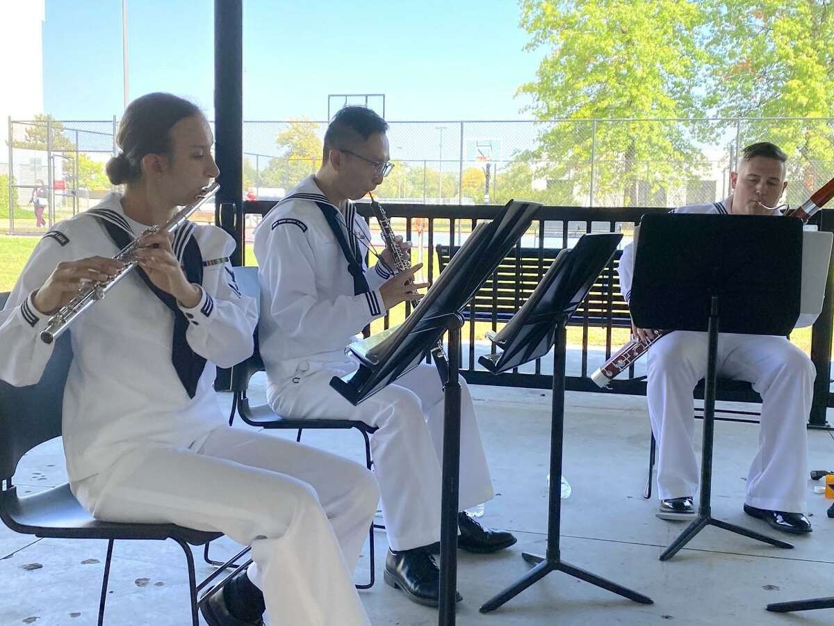 U.S. Navy Musician 3rd Class Rachael Dobosz, who is from Shelton, Conn., and who is assigned to Navy Band Great Lakes from the Navy Office of Community Outreach, NAVCO, recently plays the flute instrument, while performing at the Minneapolis Veterans Affairs Hospital during the recent Minneapolis Navy Week. The week was Sept. 26, through Oct. 2. Dobosz, left, is shown with other musicians at the Minneapolis Veterans Hospital during the Navy Week.