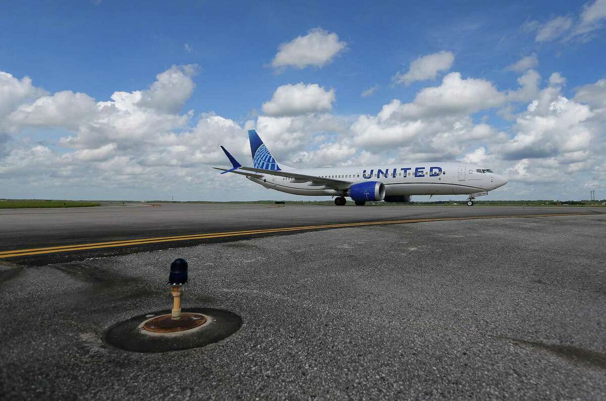 A United Airlines plane taxies at George Bush Intercontinental Airport in Houston on Wednesday, Oct. 13, 2021. 