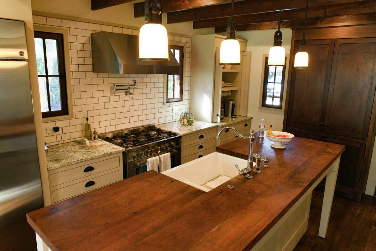 The single biggest project they undertook was the expansion and renovation of the kitchen, a project that took four months. The island is topped with mesquite wood butcher block.