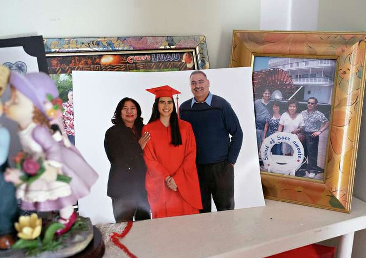 A photo of Jessica Ramos’ high school graduation on the mantel of her childhood home in Oakland.