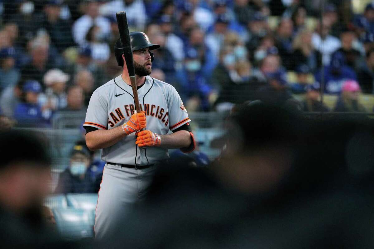 San Francisco Giants Darin Ruf (33) warms up in the on-deck circle during the top of the first inning as the San Francisco Giants played the Los Angeles Dodgers in Game 4 of the National League Division Series at Dodger Stadium in Los Angeles, Calif. on Tuesday, Oct. 12, 2021.