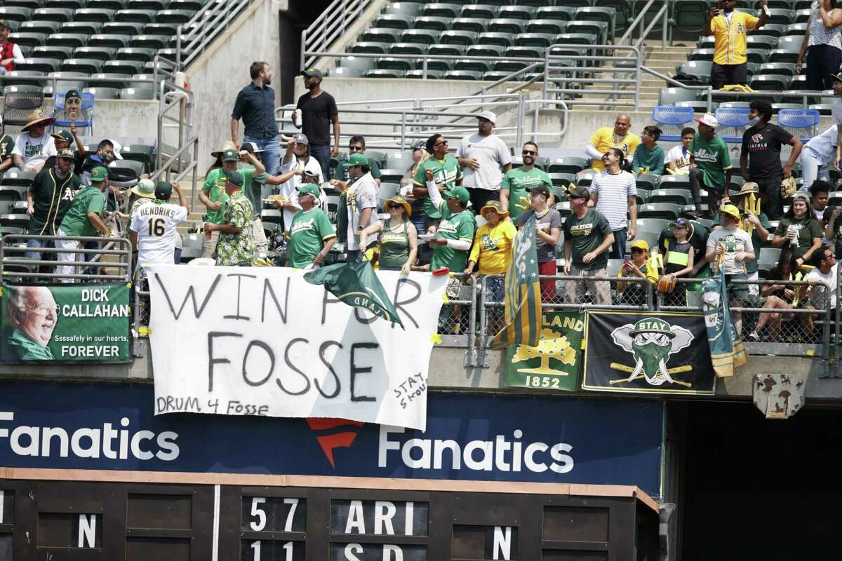OAKLAND, CA - AUGUST 7: Oakland Athletics fans hang a banner in support of Ray Fosse during the Athletics game against the Texas Rangers at RingCentral Coliseum on August 7, 2021 in Oakland, California. The Athletics defeated the Rangers 12-3. (Photo by Michael Zagaris/Oakland Athletics/Getty Images)