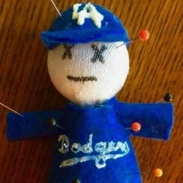 Crystals candles and voodoo dolls This Giants fan is doing everything she can to help them beat the Dodgers