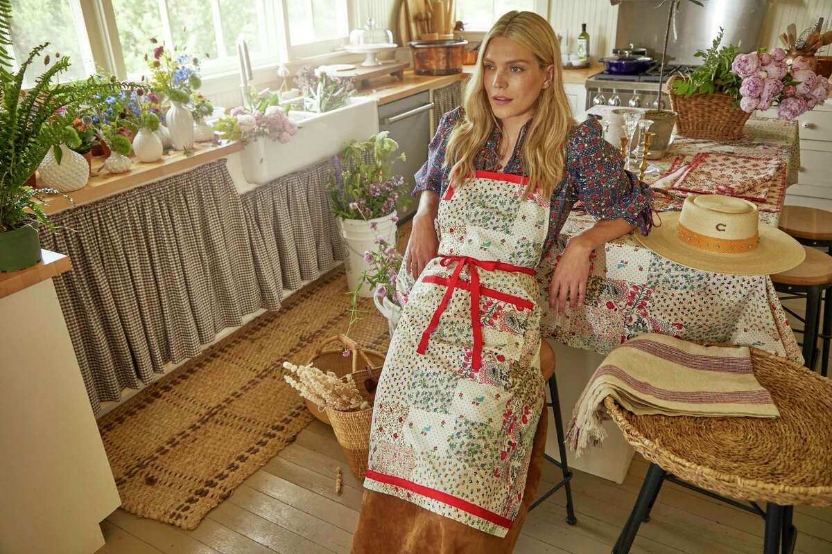 Marcia Smart's aprons anchor Hunter Bell’s first tabletop collection.