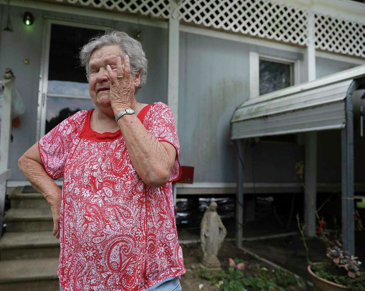 HUD must disclose flood risk to protect low-income homebuyers. Linda Satsky wipes tears away from her eyes as she talks about getting rejected from FEMA for assistance in Liberty, northeast of Houston. Officials met in 2019with residents to discuss a $6.7 million HUD grant to buy out homes near the Trinity River.