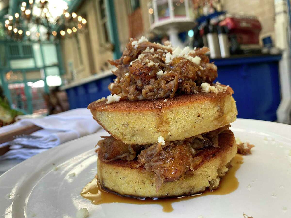 Brunch in Ocho at the Havana on the River Walk hotel includes plantain cakes with carnitas.