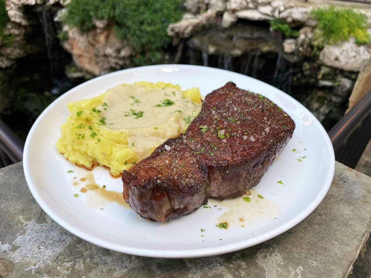 A cast iron-seared rib-eye steak is a centerpiece of the menu at Range at Embassy Suites by Hilton San Antonio Riverwalk Downtown.